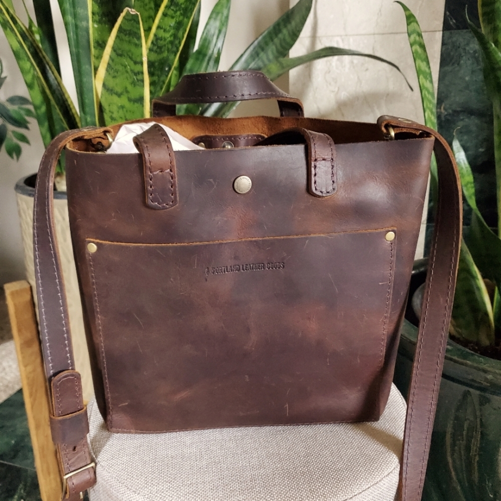 Portland leather mini tote with snap closure.
